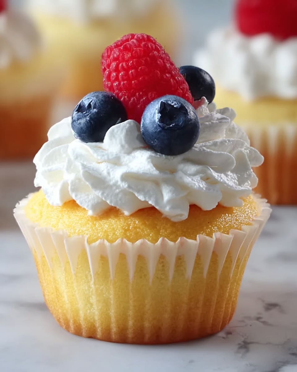 Angel Food Cupcakes with Whipped Cream and Berries Recipe - Recipe Image