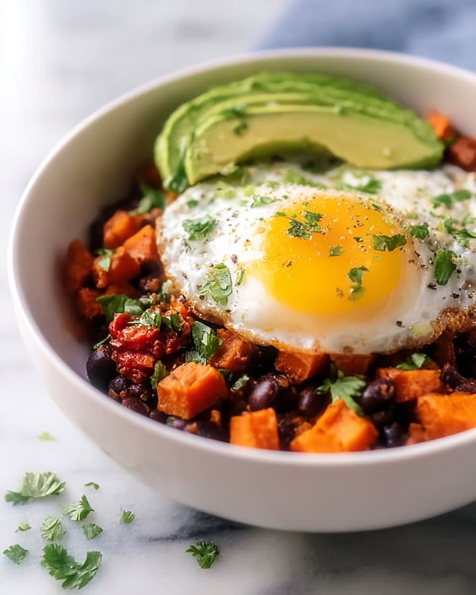 Southwest Sweet Potato Hash with Eggs, Black Beans, and Avocado Recipe - Recipe Image