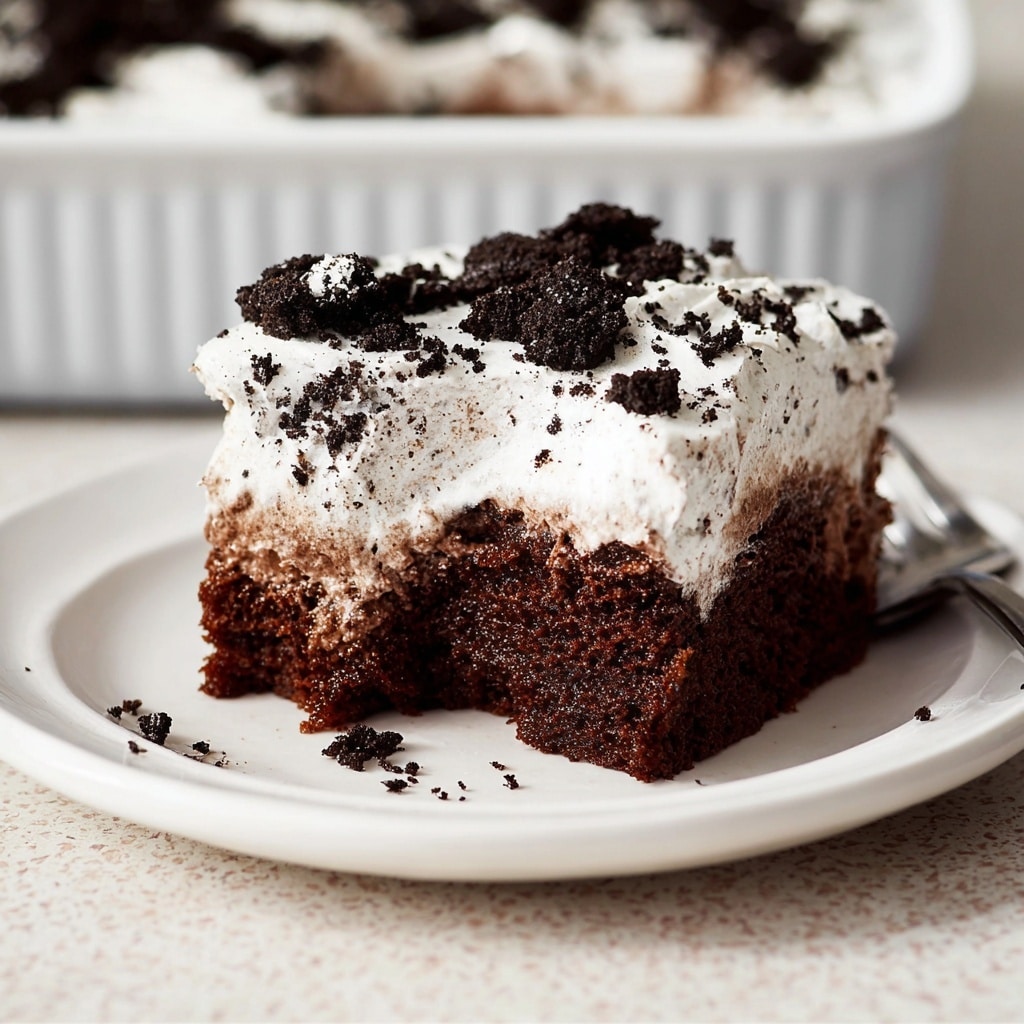 Oreo Pudding Poke Cake Recipe - Recipe Image